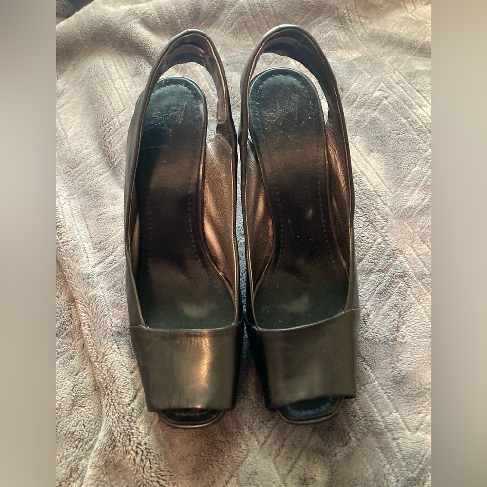 Black open toed sling back shoe